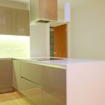 Modern kitchen with sleek cabinets and worktop