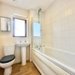 Modern bathroom with bathtub and shower