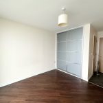 Modern empty room with wood floor and wardrobe.