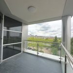 Modern balcony with city and nature views