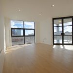 Bright modern apartment with large windows.