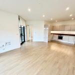 Spacious modern kitchen and living area.