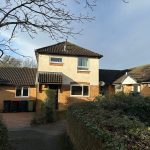 Terraced houses with bins in front garden area