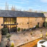 Stone barn conversion with courtyard