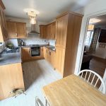 Wooden kitchen cabinets and dining table