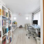 Bright room with bookshelves and desk