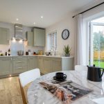 Modern kitchen with open garden view