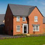 Modern red brick house with garden