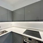 Modern grey kitchen with sink and hob