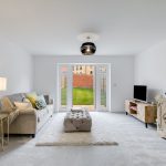 Spacious modern living room with garden view.